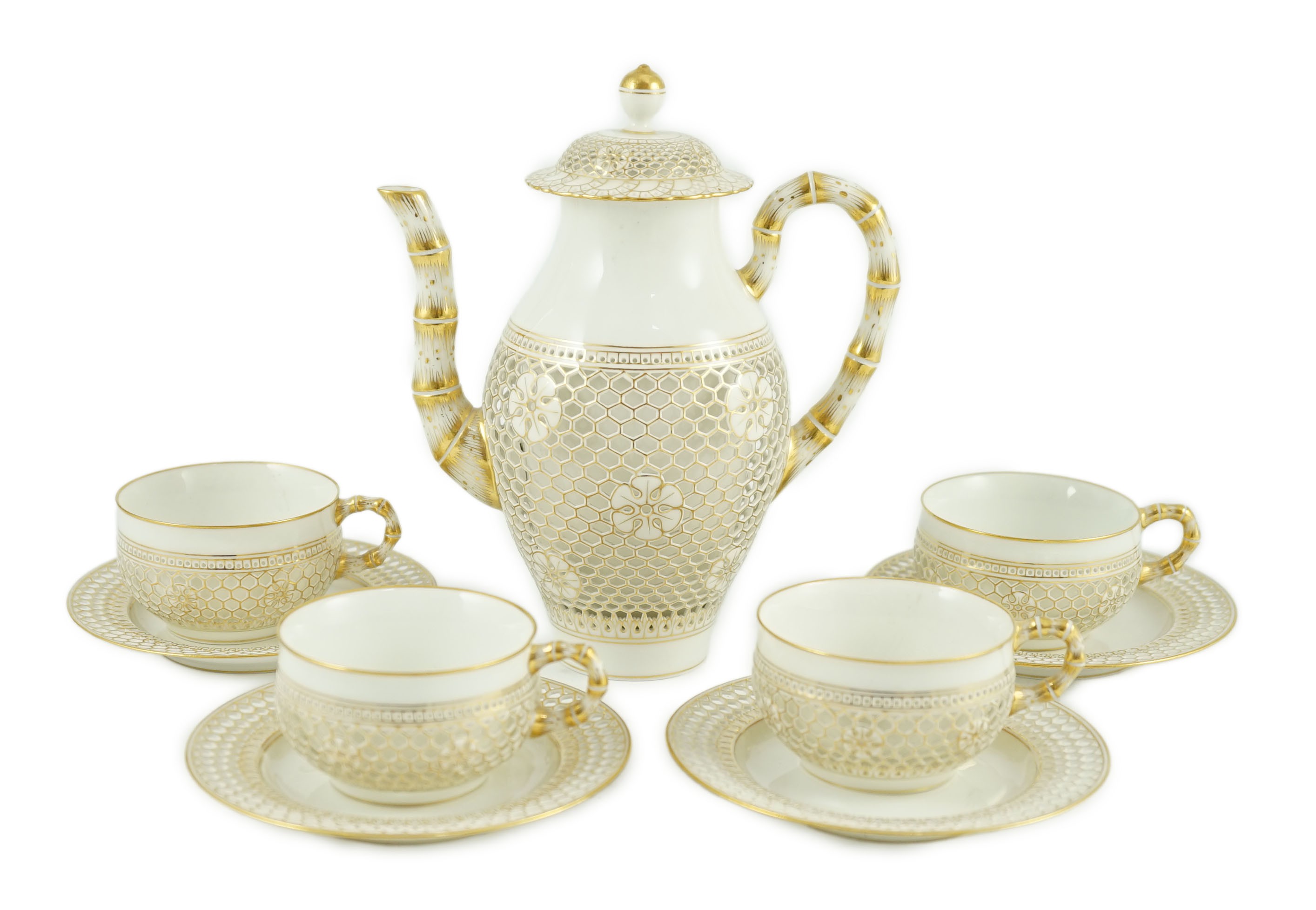 A Sevres reticulated part coffee set, early 20th century, coffee pot 19cm high